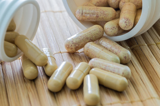 Intenergy Pill Supplements and Bottle on a table