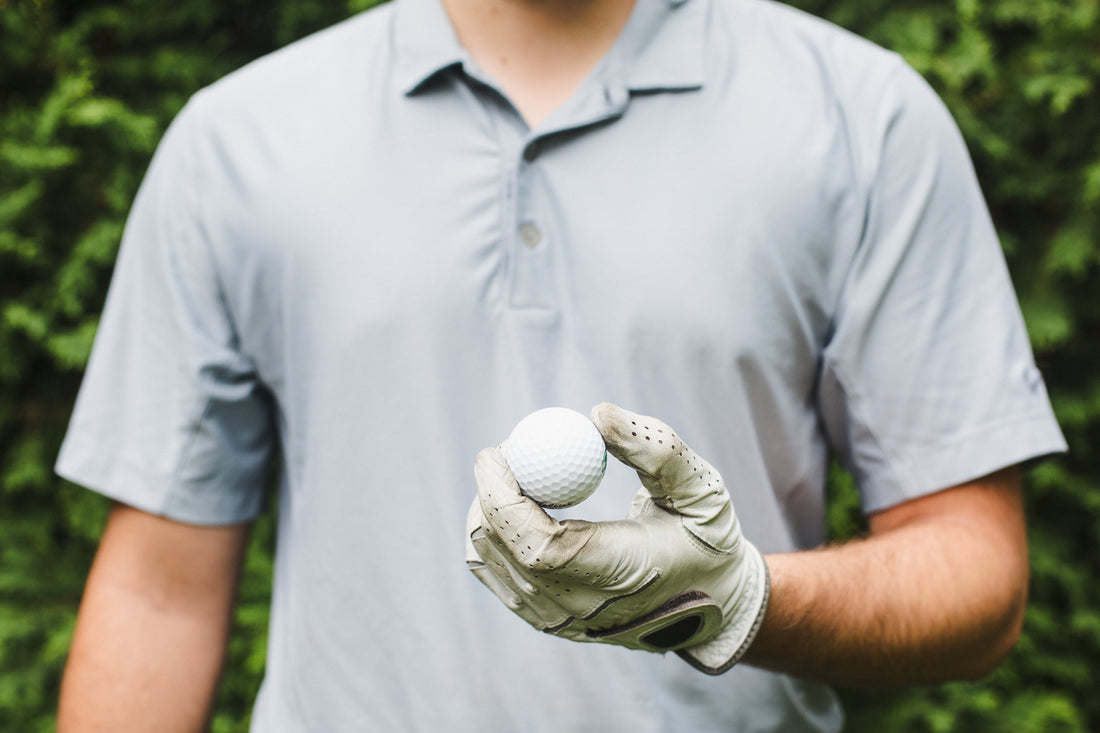 Male althlete playing golf 